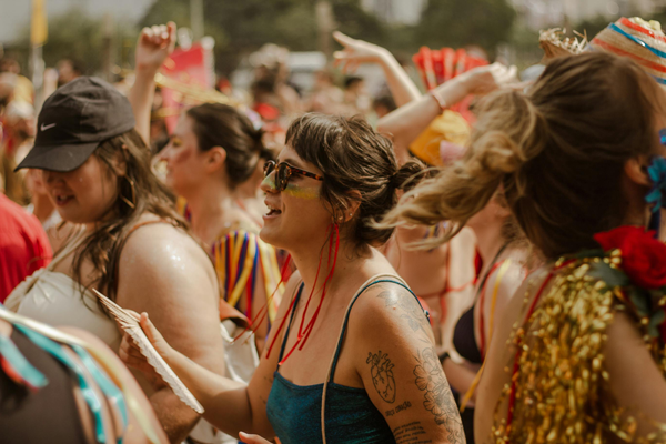 Festival-Season Safe-Sex Girl in crowd